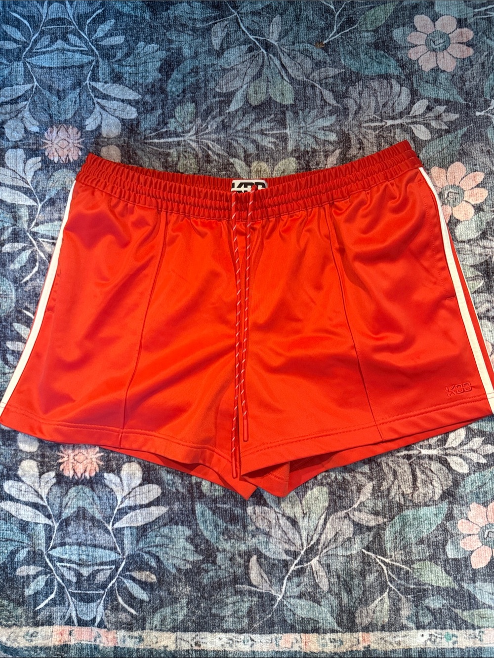 Women’s Red Athletic Shorts with White Side Stripe